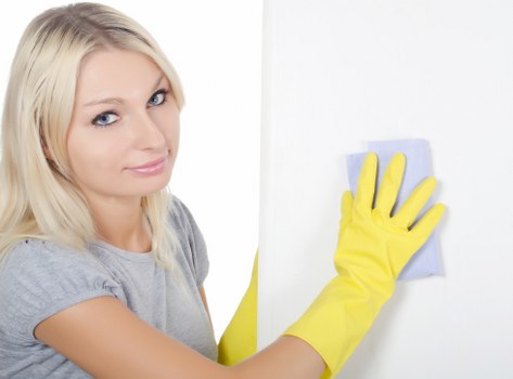 Carpet cleaners in Croydon treating a stained carpet with specialist equipment